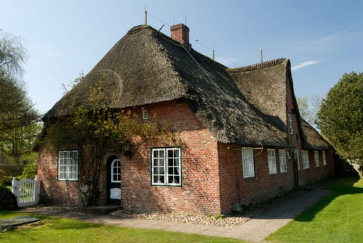 North German house with thatched roof