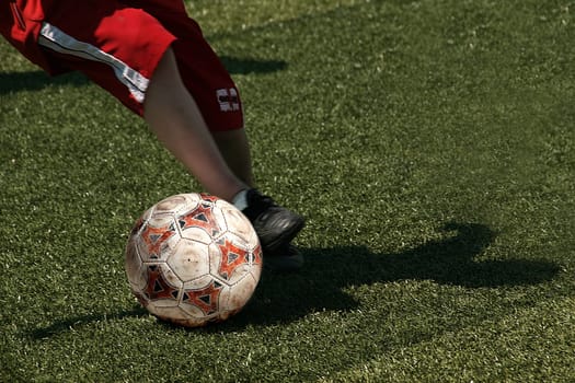 Soccer kicker in red