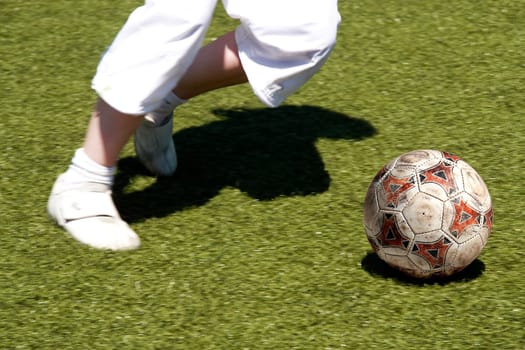Soccer kicker in white