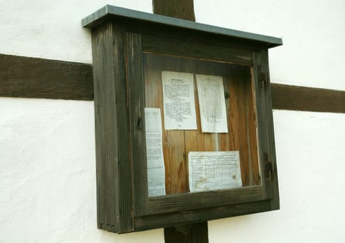 Old notice box on a half-timbered house