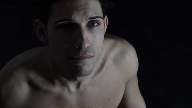 Close up Face of a Pensive Handsome Young Man with Tears in His Eyes, Worried or Sad.