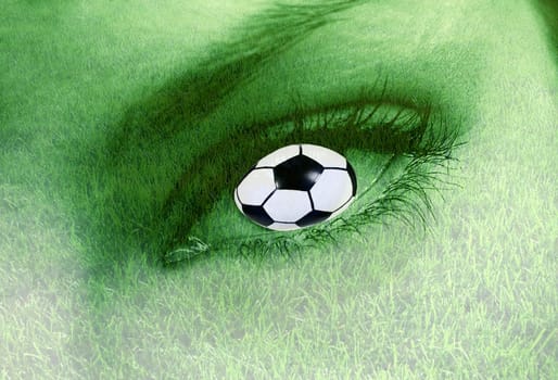 Eye with football iris and grass background