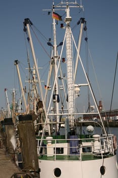 Crab cutter in the old fishing port of Cuxhaven (North Sea)