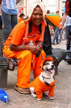Oranje mistress with dog
