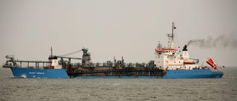 Fully loaded suction dredger in the North Sea off Cuxhaven