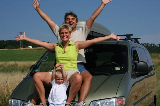 Family with car