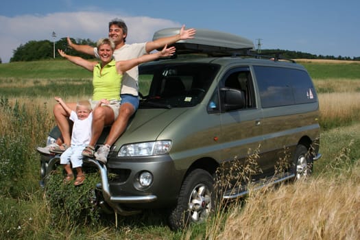 Family with car