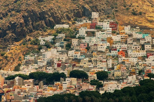In the north of Tenerife you will find some housing estates that are not as massive as in the south! I am disappointed by the south,because one hotel is being built next to the other.....!