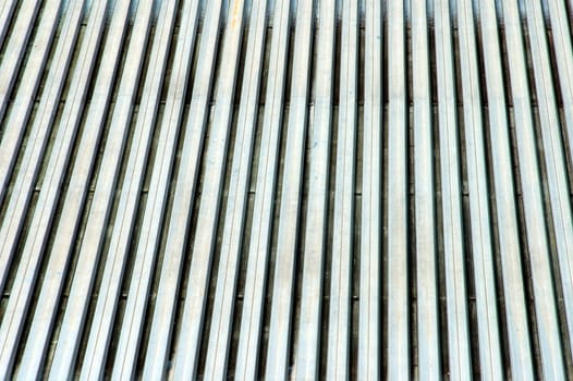 Hoarfrost-covered metal grille