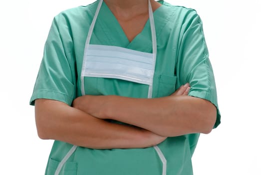 Crossed arms of a doctor with a face mask