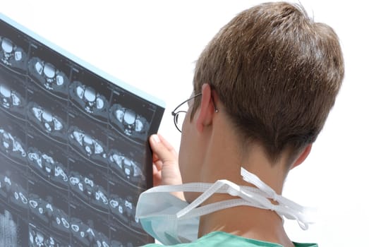 Doctor looks at X-ray