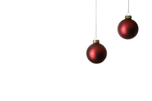 Two red Christmas tree baubles,cropped