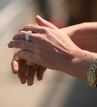Hands of an elderly lady with jewelry