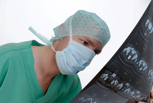 Doctor looks at an X-ray