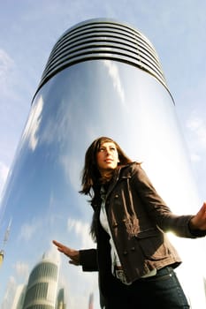 Woman in front of pillar