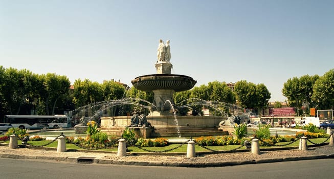 The great Rotonde fountain,erected in 1860,is crowned by 3 statues symbolizing Justice (facing Cours Mirabeau),agriculture (facing Marseille) and fine arts (facing Avignon) - 6x7
