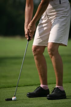 Golfer putting