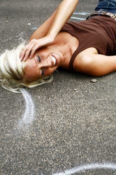 Woman lying on the street