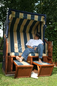 Relax in a beach chair in the garden