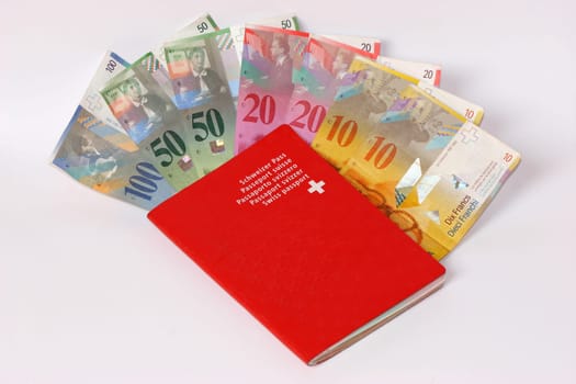 Swiss passport with banknotes