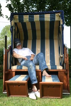 Relax in a beach chair in the garden