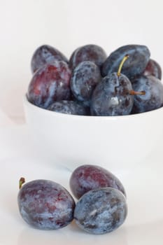 Plums on a white background