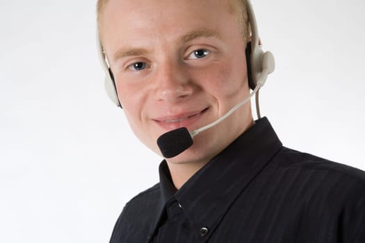 A young sympathetic man with a headset