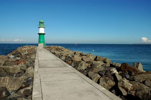 That's how I like it best - the lighthouse of Warnemünde. When it is so beautifully empty,I also have time to watch the sea,see the ships arrive and just enjoy peace and loneliness! If I'm honest,I'm looking forward to
