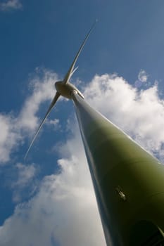 Wind turbine in front of a cloudy sky