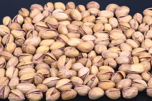 Salted pistachios in shell and loose