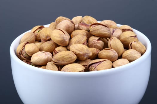 Salted pistachios in shell and loose