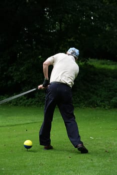 Golfers tee off