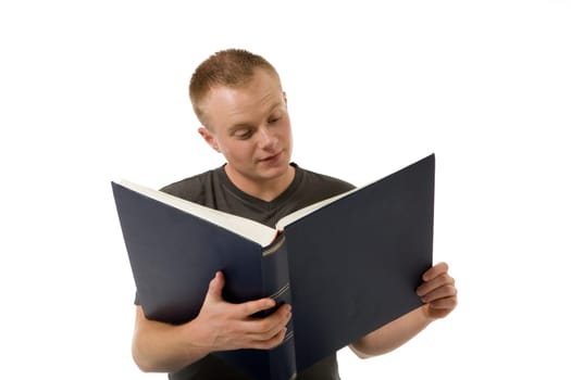 A young man with a big book