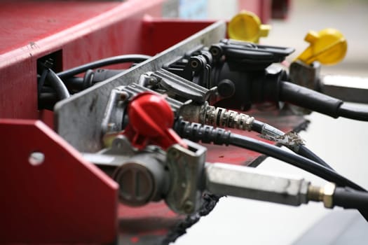 Connecting cables and plugs on a truck between tractor and trailer