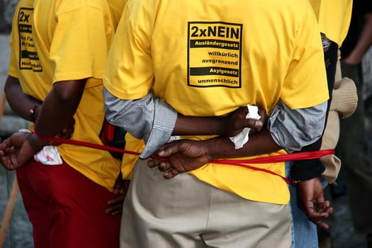 NO to the inhumane asylum law The stricter asylum law is inhumane. It represents anti-abuse on protection from persecution and violates the Refugee Convention. Persecuted people and their families are endangered instead of protected. The Mas