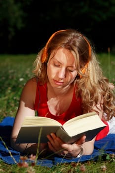 Student with book and headphones IX