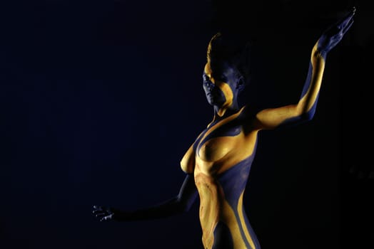 Woman,Bodypainting,Painted,Blue,Yellow,Gold,Sun,Ray,Rays,Body,Nude,Nude,Breast,Body Painting,Painted,Color,Torso,Sculpture,Statue,Art,Calendar,Static,Abstract,Figure