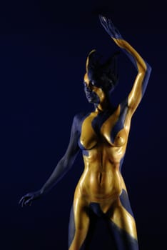 Woman,Bodypainting,Painted,Blue,Yellow,Gold,Sun,Ray,Rays,Body,Nude,Nude,Chest,Body Painting,Painted,Color,Torso,Sculpture,Statue,Art,Calendar,Static,Abstract,Figure,Shine