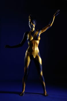 Woman,Bodypainting,Painted,Blue,Yellow,Gold,Sun,Ray,Rays,Body,Nude,Nude,Chest,Body Painting,Painted,Color,Torso,Sculpture,Statue,Art,Calendar,Static,Abstract,Figure,Shine