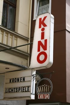 Illuminated sign at an old cinema