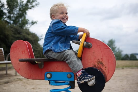 A little girl on a seesaw