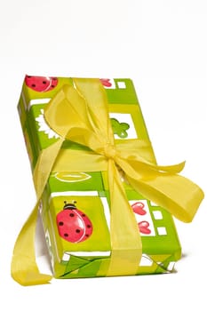 Gift wrapped with bow on white background