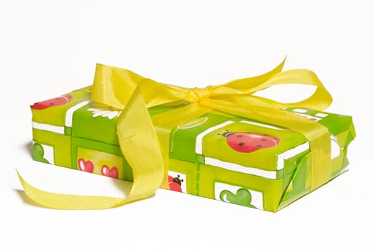 Gift wrapped with bow on white background