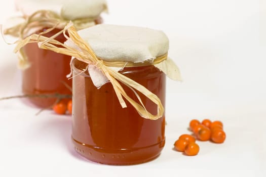 Jam jar against a white background