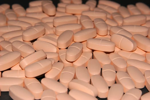 78 tablets on a black background