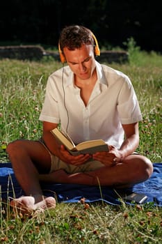 Student with book and headphones I