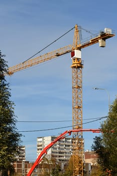 Moscow, Russia - Oct 11.2023. Liebherr crane and concrete pump at construction of a school in Zelenograd