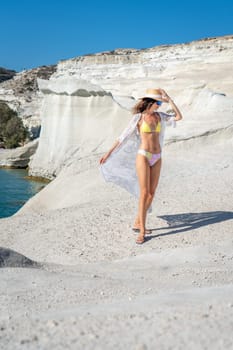 Model in bikini on Sarakiniko beach, Milos Island
