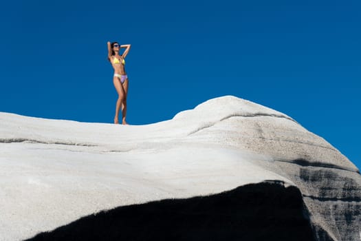 Model in bikini on Sarakiniko beach, Milos Island