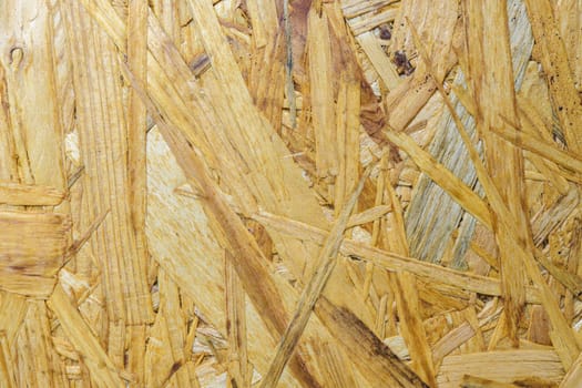Pressed wooden Board. Textured background. Texture OSB.